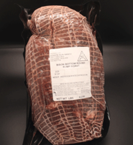 Bison bottom round roast in vacuum-sealed packaging, labeled with weight and storage instructions. Ideal for grilling, roasting, or slow cooking for a flavorful and lean meal option.